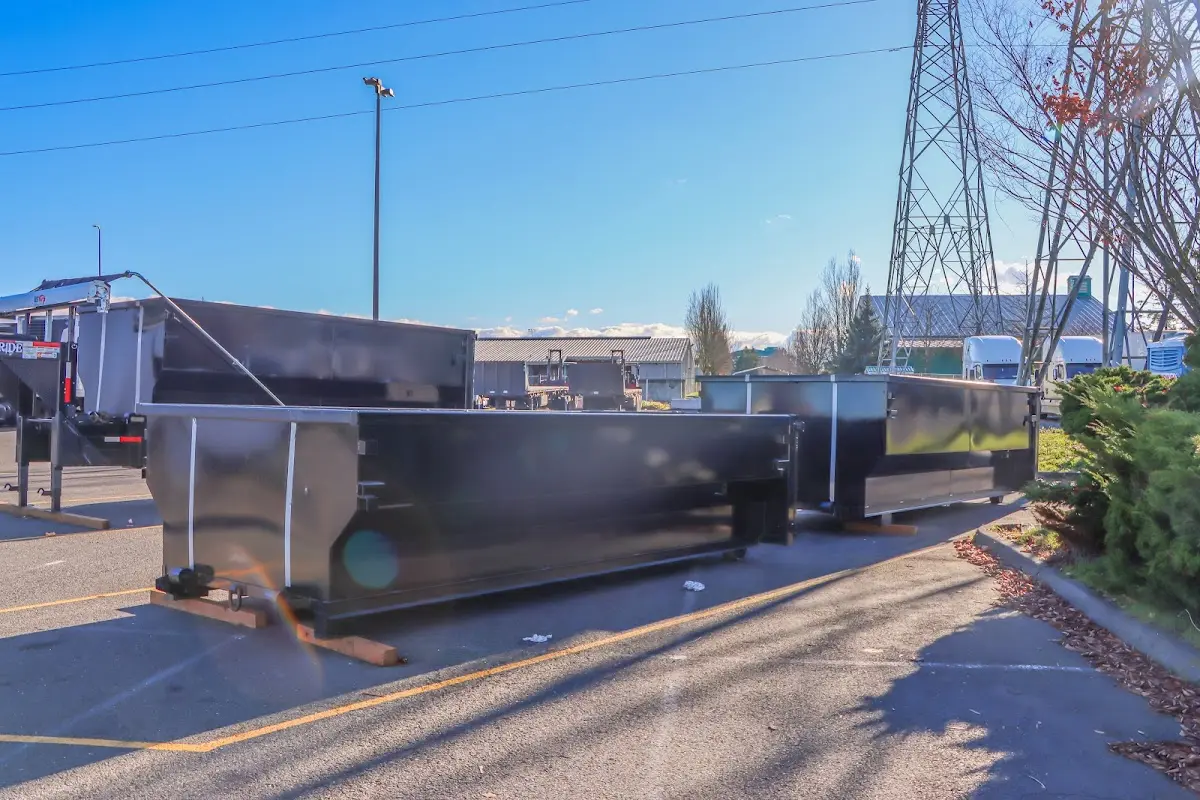 Roll-off dumpster ready for waste disposal at job site for 6 Yard Dumpster Rental in Hudson